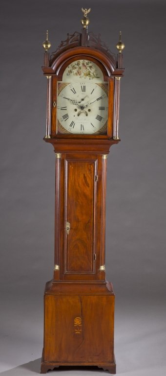 David Wood tall case clock Newburyport, Conn: A mahogany tall case clock, David Wood, Newburyport, Connecticut. c.1800-15. Mahogany veneered case with decorative wood inlay of a lighter color. Molded edge doors support a decorative brass eagle fo