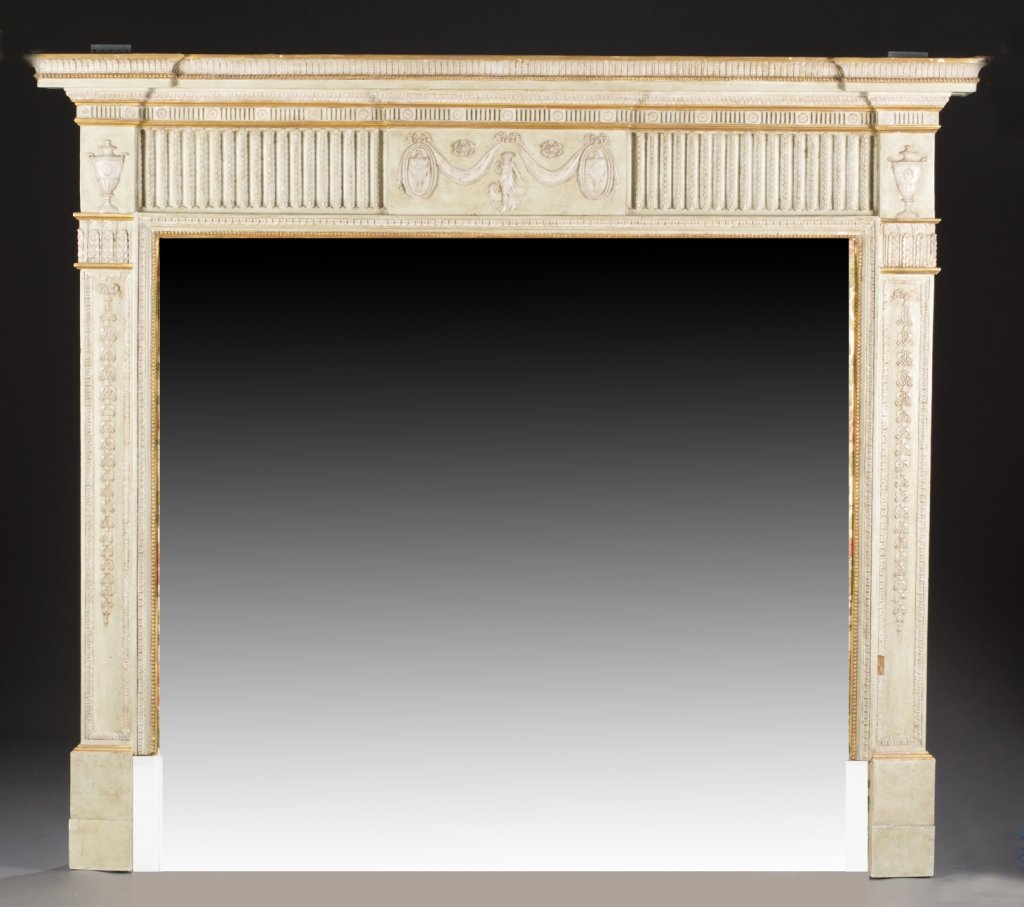 18th century English wood mantle. George III: An English fireplace mantel. Late 18th century. Having carved George III motif of classical figures with urns and acanthus leaf. 64 1/4" x 72".