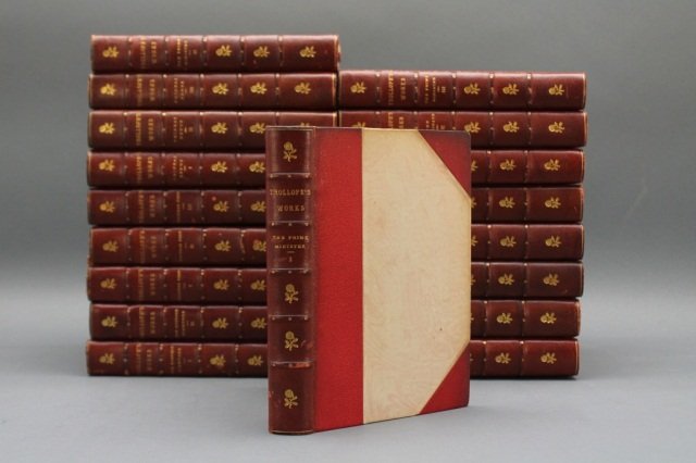 18 Vols: Anthony Trollope. Dodd, Mead, 1910-1913.: Trollope, Anthony. 7 Sets (18 Vols). NY: Dodd, Mead & Company. 8vo. Uniform ½ red leather and marbled board, small gilt floral decoration in 4 of the spine panels. Moldstaining to covers and occasion
