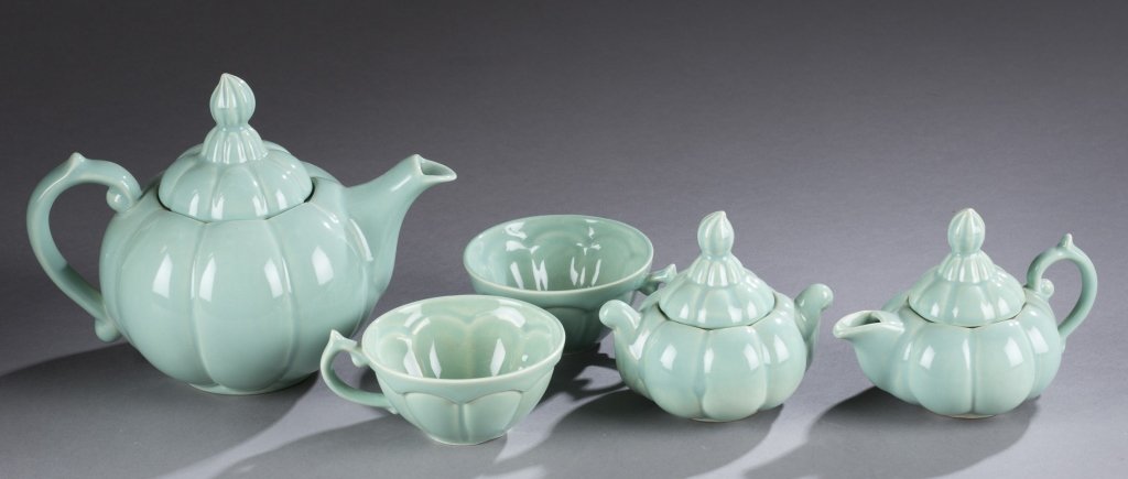 A Cowan Pottery tea set by Elizabeth Frazier. c. 1929.: A Cowan Pottery tea set by Elizabeth Frazier. c. 1929. Ming green glaze. Impressed Cowan mark on bottom of tea pot. ++ Pot: 5 3/4"h x 7 1/2"w. ++Small pot: 4"hx 5"w. ++ Small creamer: 4"h x4"w. ++ Cup