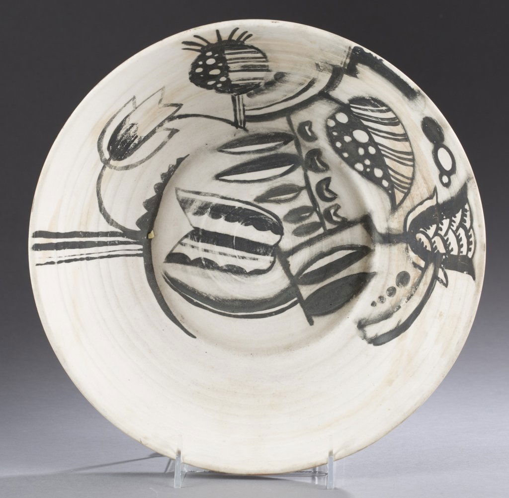 A Cowan Pottery unglazed bisque ware bowl with: A Cowan Pottery unglazed bisque ware bowl with informal decoration. Impressed Cowan mark on bottom. 11".