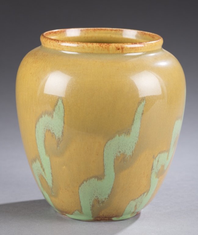 A Cowan Pottery vase with hand painted decoration.: A Cowan Pottery vase with hand painted decoration. c.1930. April green on caramel. Having worn impressed Cowan mark on bottom. 5 1/4"h x 3 1/2"w.