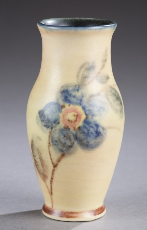 A Rookwood vase by Elizabeth Barrett. 1931. Blue: A Rookwood vase by Elizabeth Barrett. 1931. Blue floral design and matte glaze. Impressed on bottom, Rookwood mark, XXXI, 6142 and artist mark. 4 3/4".