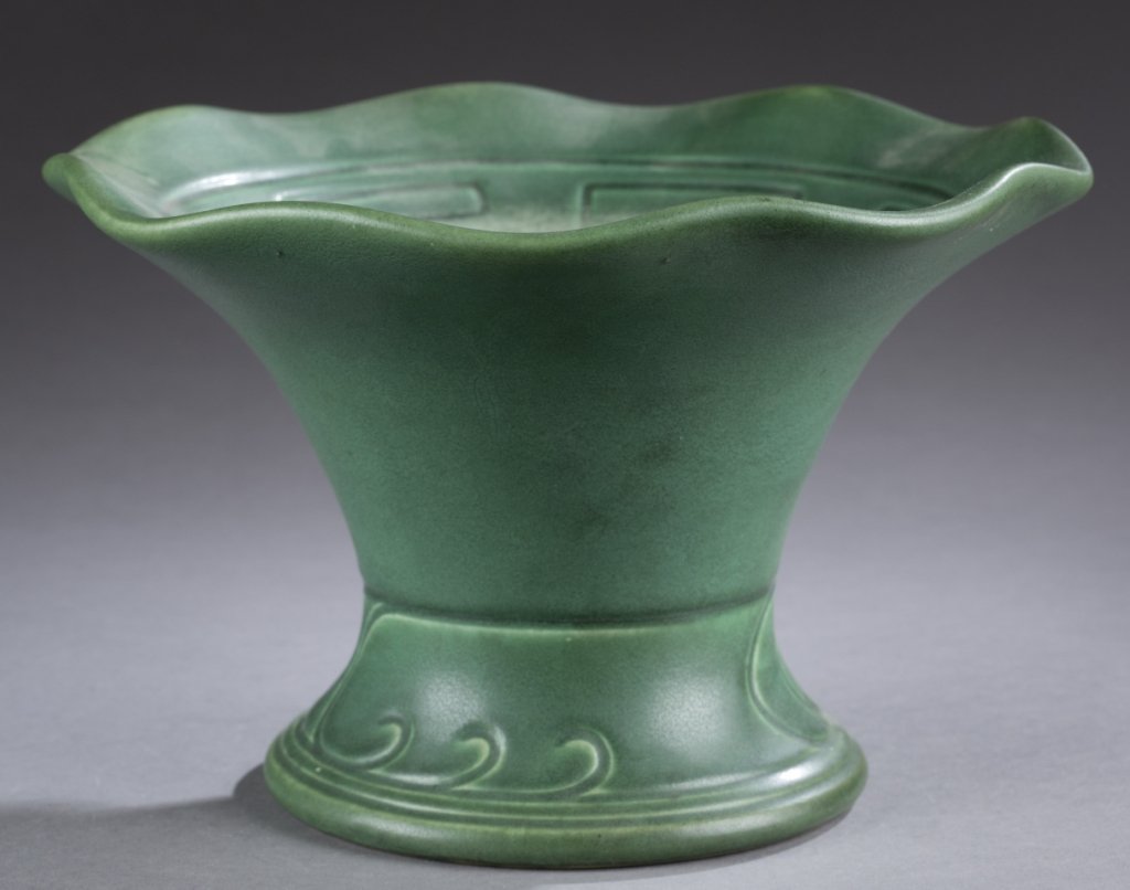 A Rookwood Z line production vase. 1903. Matte green: A Rookwood Z line production vase. 1903. Matte green vase with wave design around base and scalloped rim. Impressed on bottom, Rookwood mark, Z, shape 622 and date. 6".
