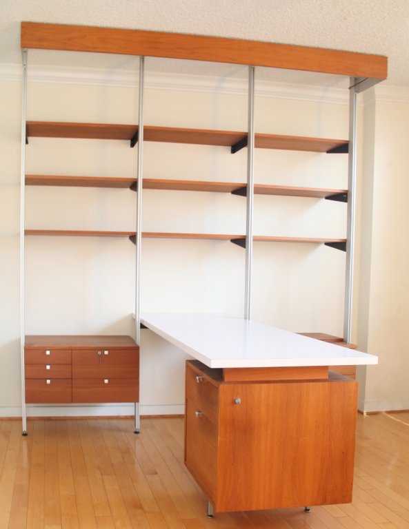 Herman Miller office unit.: A George Nelson for Herman Miller office unit. 20th century. Comprehensive Storage System (CSS) having two storage cubes each under 6 adjustable shelving units and desk attachment with two drawer cabi