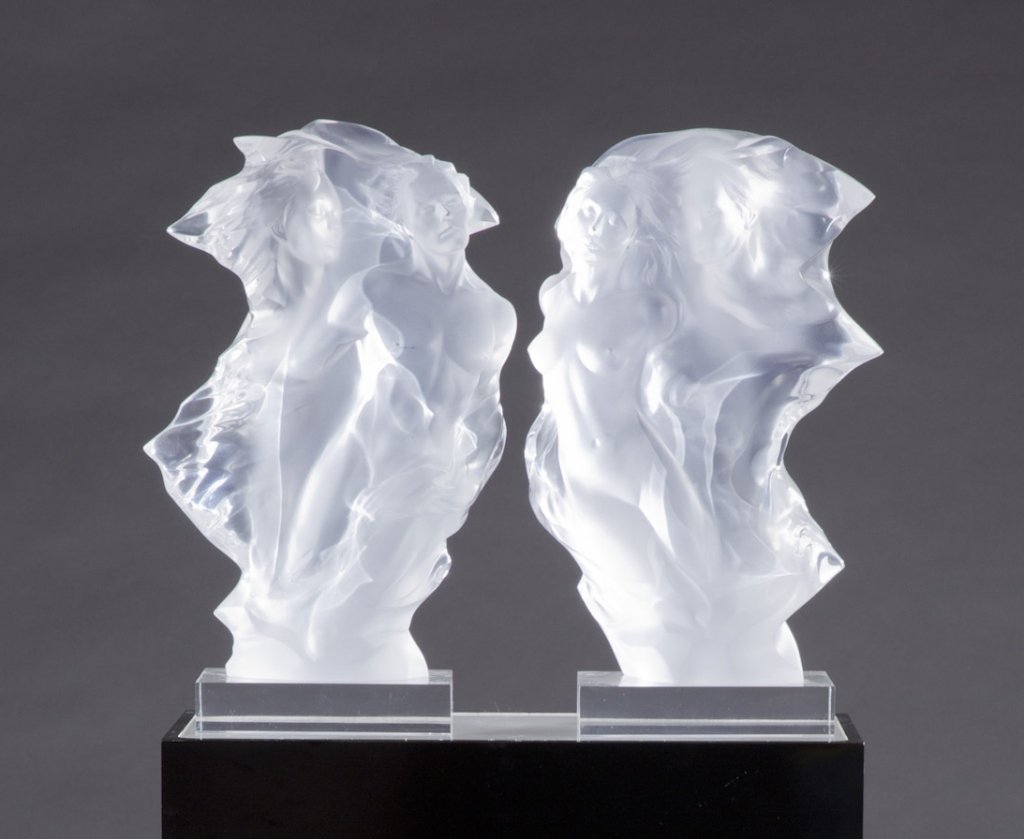 Frederick Hart acrylic sculpture Duet on stand.: Frederick Hart (American, 1943-1999) Pair of acrylic sculptures "Duet". 1996. Quarter size clear acrylic resin. On a black plexiglass pivoting illuminated stand. Engraved on base of female sculpture,