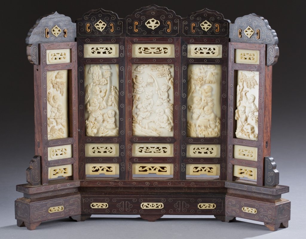 Small table screen.: A small wooden and ivory table screen. Republic of China. Having five panels of animated figures in wooden frame. 9 1/4"h x 11 1/2"w