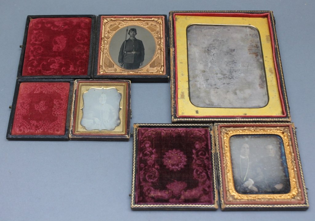 4 Daguerreotypes/Ambrotype: Civil War, GW Monument: [Civil War/GW Monument]. 4 Daguerreotypes & Ambrotypes: 3 Civil War & 1 GW Monument Partial Case. ++Ambrotype of Union Soldier posed with Rifle. Sixth-plate size, 2 3/4" x 3 1/4"; Leather case, frame 