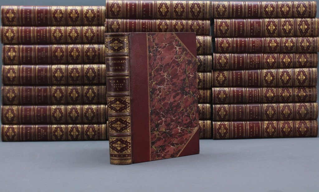 The Works of WIlliam Makepeace Thackeray. 27 Vols.: [Thackeray, William Makepeace]. THE WORKS OF WILLIAM MAKEPEACE THACKERAY. 27 Vols total: 24-volume set + duplicate of 3 volumes (Vanity Fair, 2 Vols; The History of Henry Esmond). Lon: Smith, Elder & 