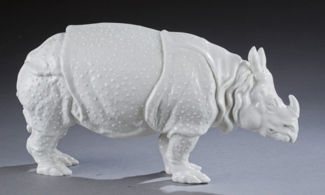Frankenthal ceramic Rhino.: A Frankenthal porcelain rhino. 20th century. Marked on underside in blue underglaze. 14 1/2". Condition: Slight staining to objects surface on underside and backside. No evidence of past damages or re