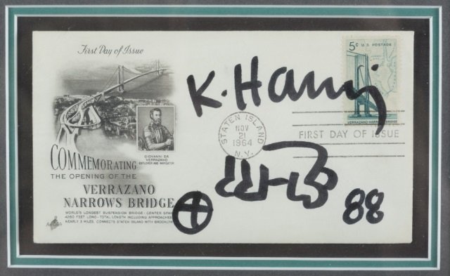 Keith Haring, autograph.: An autographed Keith Haring commemorative first day cover of the Verrazano bridge. c.1988. Framed and behind glass. Sight: 5 1/8" x 7 7/8". Frame: 12 1/4" x 15".
