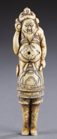 A Japanese ivory sashi netsuke of foreigner.: A Japanese ivory sashi netsuke of foreigner. 18th century. Mongolian? Figure with decorative robes, with karako on head. Himotoshi on back with signature to the right. 14.46cm. Provenance: The Humphre