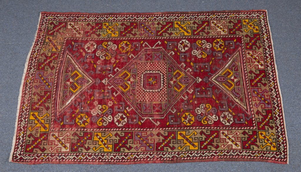 An Antique Turkish Oushak Wool rug, 3'1" x 5'9".: An Antique Turkish Oushak Wool rug, 3'1" x 5'9".