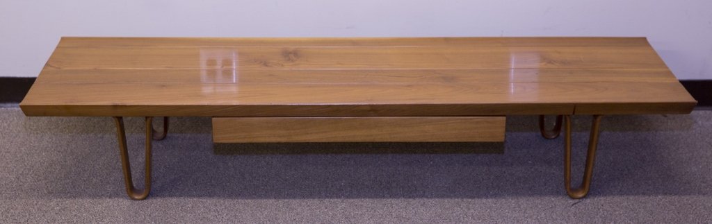 Mid-century modern coffee table.: An Edward Wormley Long John coffee table model 4699. c.1946-1949. Marked on underside 4699. Without manufacturer's sticker. 11.75"h x 84" x 19d.