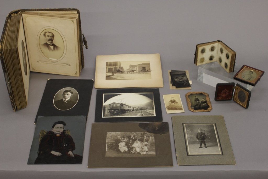 Misc. CDVs, Albumens, postcards, tintypes & ambro.: A group of miscellaneous CDVs, Albumens, postcards, tintypes & 1 ambrotype with case. ++ Misc. CDV's including sepia toned, landscapes, portraits & 1 large painted tintype. ++ 1 tinetype w/ case. ++ 1