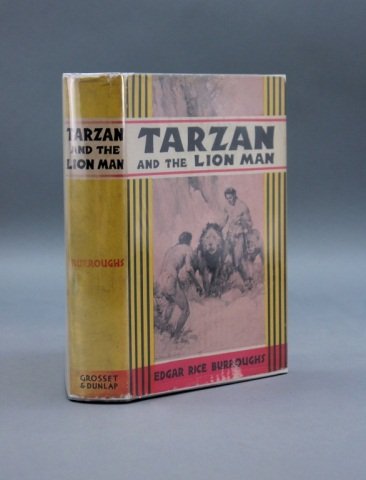 Burroughs. TARZAN AND THE LION MAN. 1st edition.: Burroughs, Edgar Rice. TARZAN AND THE LION MAN. Tarzana, CA: Edgar Rice Burroughs, (©1934). 8vo. Gray cloth, dark navy blue lettering, small red and black illustration on spine and front cover, top e