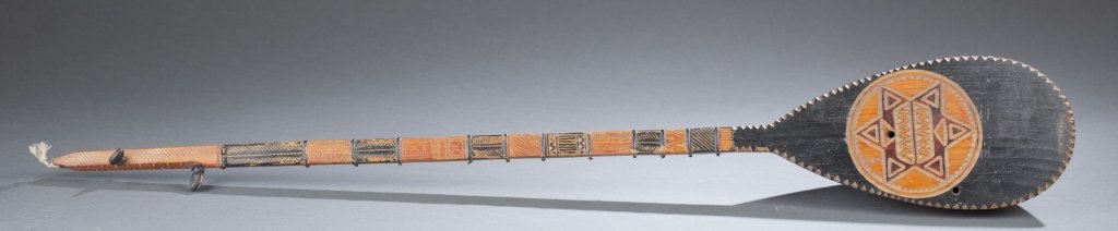 Pair of european lutes. 20th century.: Saz (Long-necked lute). 20th century. Eastern Mediterranean, possibly Syria. Plucked string instrument has 3 string; 12 gut frets; a triangular-shaped body; 3 sound holes; red and black paint. Total l