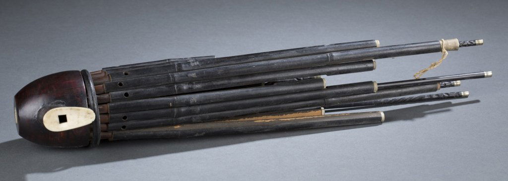 Sheng (Mouth organ). c.1950.: Sheng (Mouth organ). c.1950. Northern China. Signature: labeled "XINGHA" and Chinese characters (a blue and gold sticker attached to one of the longest pipes). Free reed instrument. This instrument ha