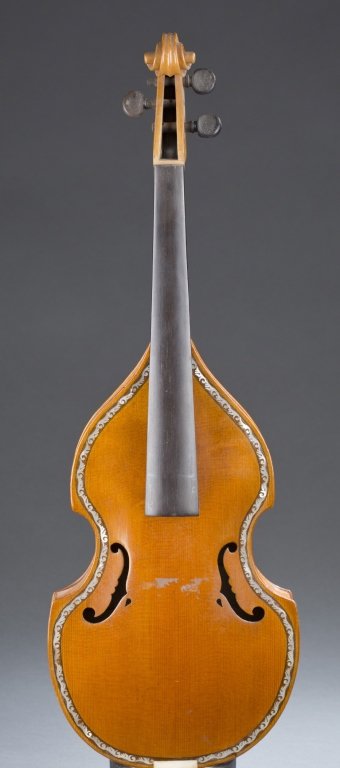 Philomela (Violin variant). Mid 19th century.: Philomela (Violin variant). Mid 19th century. Location unknown. Bowed string instrument. This instrument has 4 strings; c-shaped sound holes; made of curly maple. Total length: 57 cm. Width: 15.8 cm. 