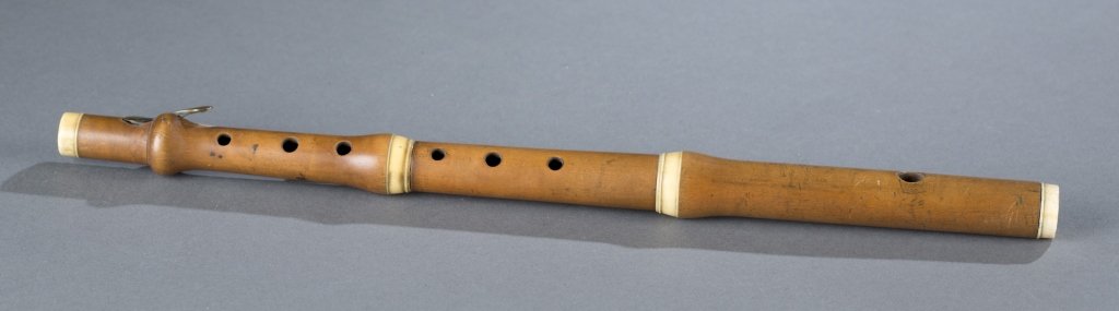 Piccolo in B flat, high pitch. c.1858-66.: Piccolo in B flat, high pitch. c.1858-66. London, England. Maker: D'Almaine & Co. Signature: D'Almaine & Co. 104 New Bond Street London B. Woodwind instrument. This instrument has a 3-piece boxwood bo