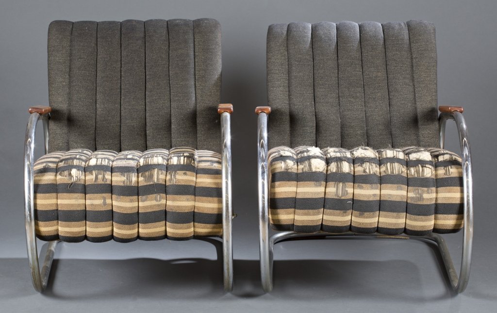 Pair of tubular chrome chairs Amsterdam: A pair of tubular chrome chairs Amsterdam. 1935. Black, brown and tan upholstery. 29 1/2"h x 25 3/4"w x 32"d.