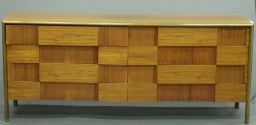 Edmund J. Spence sculpted front walnut dresser: UC Edmund J. Spence walnut sculpted front dresser. 32 1/2" x 78" x 20".