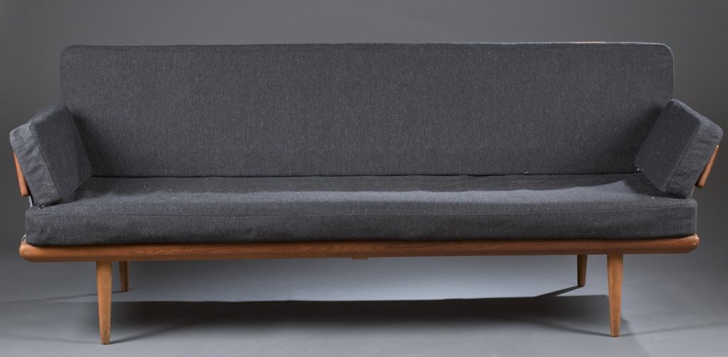 Hvidt and Molgaard-Nielson sofa.: A Peter Hvidt and Molgaard-Nielson sofa. c.1950. Designed for Designed for the Danish company France and Daverkosen. Sofa with two arms. Teak and charcoal gray wool upholstery. Maker's sticker on unde