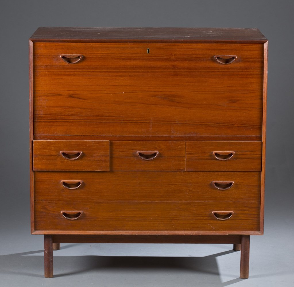 Hvidt and Molgaard Nielson bar cabinet.: A Peter Hvidt and Orla Molgaard Nielson bar cabinet. c.1950s. Made by Soborg Mobelfabrik of Denmark. Teak with a small bar on top and 5 drawers on bottom.