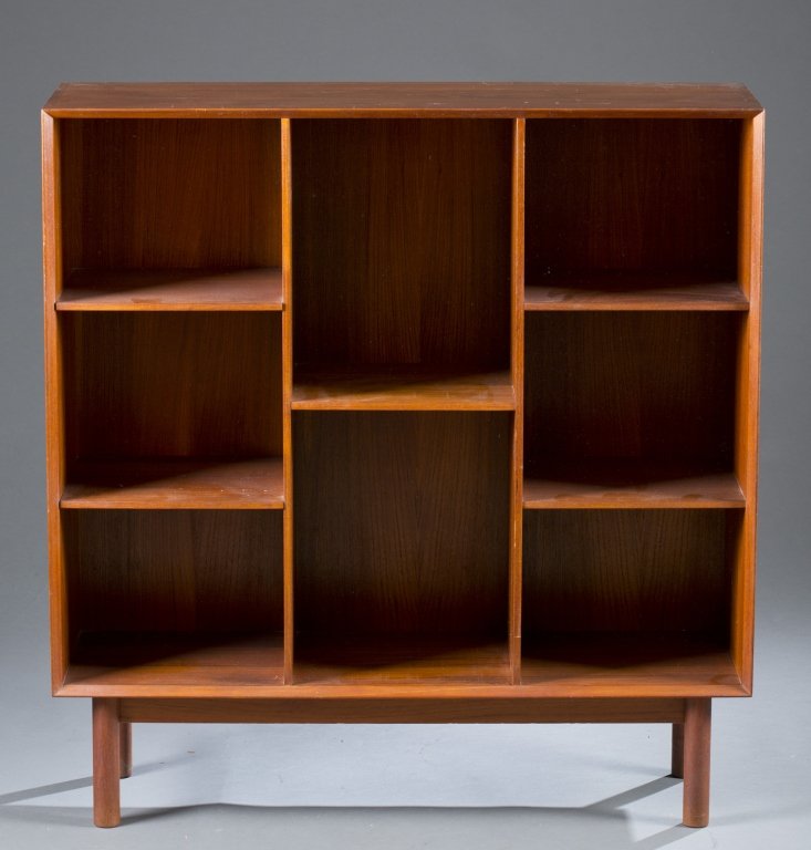 Hvidt and Molgaard-Nielson bookcase.: A Peter Hvidt and Orla Molgaard-Nielson bookcase. Mid 20th century. Teak with dovetail joinery and with adjustable shelves. 37"h x 35 1/2"w x 11"d.