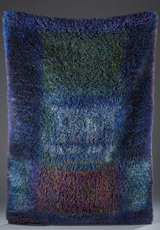 Finnish rug "Pohjanpoika" by Riva Puotila: A Finnish modern design rug by Ritva Puotila, for Friends f Finnish Handicraft. c.1960s. “Pohjanpoika” (Son of the North.” A High pile wool carpet in blue with geometric designs. Fabric label on