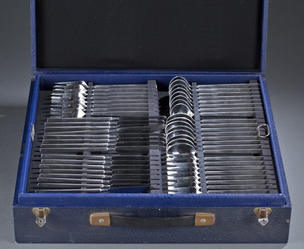 Erik Herlow Obelisk flatware set.: An Erik Herlow Obelisk stainless steel flatware set. 20th century. Denmark, by Copenhagen Cutlery. 85 piece set includes: 8 salad forks, 8 dinner forks, 8 teaspoons, 8 soup spoons, 8 fish knives, 8 di
