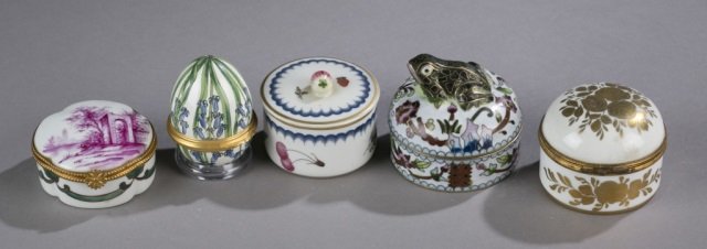 Group of 5 assorted pill boxes.: Groups of 5 assorted pill boxes. Nature scene, egg shaped decorated with lilies, berries, frog, and a gilt roses. Largest is 2 3/8" x 2 1/2".
