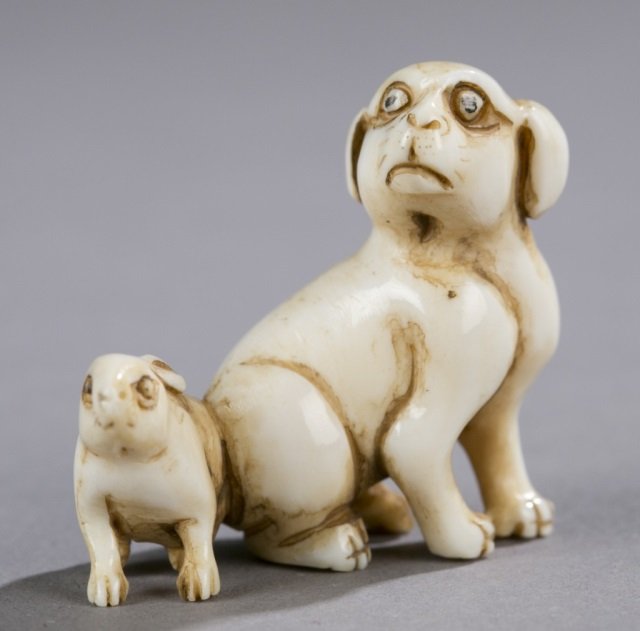 Dog and rabbit netsuke.: Dog and rabbit netsuke. 1 1/2" x 1 1/2".