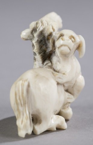 Horse and dog netsuke.: Horse and dog netsuke.