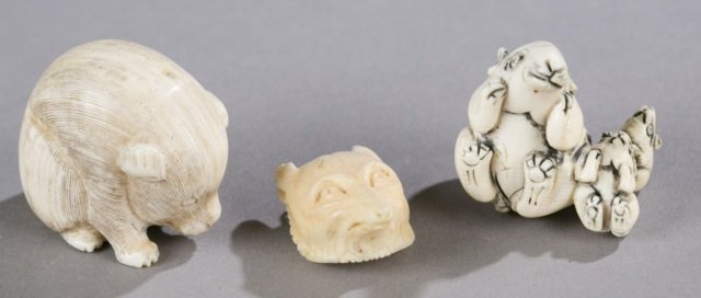Group of netsukes.: Group of netsukes. Pig. 1 1/4" x 1 1/2".++ Fox head. 1 1/4" x 3/4".++ Mice. 1 1/4" x 1 1/4".