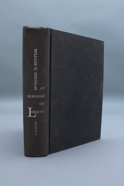 Signed by Douglas: AN ALMANAC OF LIBERTY.: [Douglas, William O.]. AN ALMANAC OF LIBERTY. Garden City, NY: Doubleday & Company, 1954. 8vo. Black cloth. Covers soiled. Slight blemish to outer margin of half title, usual minor toning to white are
