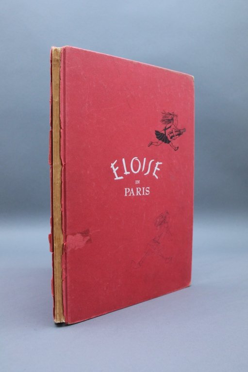 ELOISE IN PARIS. Signed & inscr by Kay Thompson.: [Children's/Eloise]. KAY THOMPSON’S ELOISE IN PARIS. Simon and Schuster, 1957, 2nd prtg. Red paper-covered boards. Worn. Lacking dj. First page following c-page is signed and inscribed by Kay Thomps