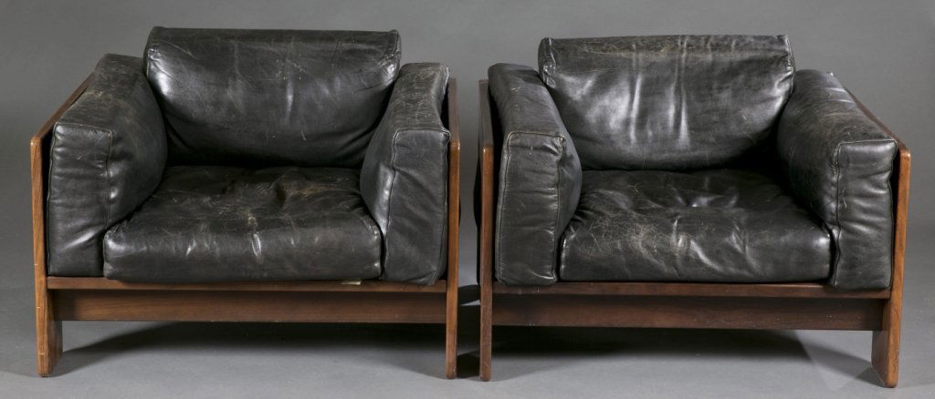 Pair of Tobia Scarpa Knoll Bastiano armchairs.: A pair of Bastiano armchairs designed for Knoll by Tobia Scarpa. Mid 20th century. Black leather upholstery with rosewood frames. 36"w x 26"h x 31 1/2"d.