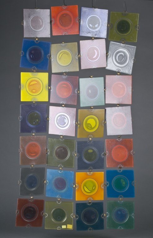 Higgins Rondelays square colored glass hanging.: A group of Higgins Rondelays square colored glass hangings. 2 sets. Multi colored glass is connected with metal rings. 5 3/8".