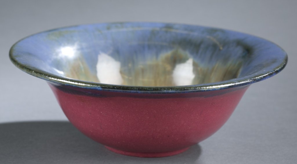 Fulper Pottery bowl: A Fulper Pottery bowl. 1909-1916. Flemington, NJ. Rose matte, venetian and Chinese blue, elephants breath,and lustre glazes. Rectangular inked mark on bottom, "FULPER" 3 1/4"h x 9 3/4"w.