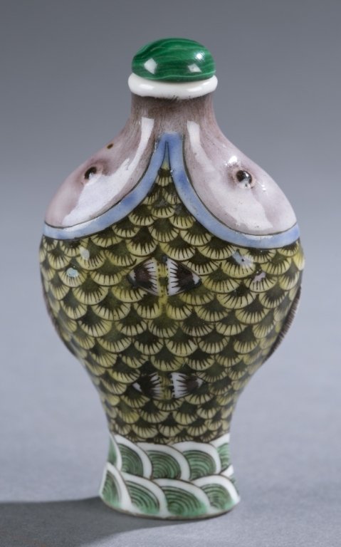 Chinese porcelain snuff bottle, form of twin fish: A Chinese porcelain snuff bottle in the form of twin fish. c.1796-1820. Having multi colored enamel glaze. 3". Australian Collection.