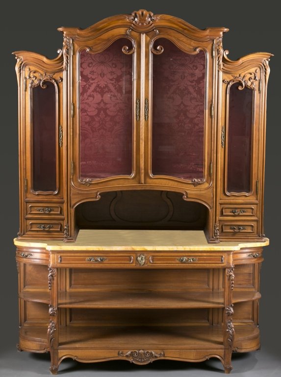 Monumental continental sideboard and cabinet.: A Monumental continental sideboard and cabinet. Late 19th / early 20th century. Rococo revival style carved hardwood cabinet and sideboard with floral brass hardware. Top center with 2 glass panel doo