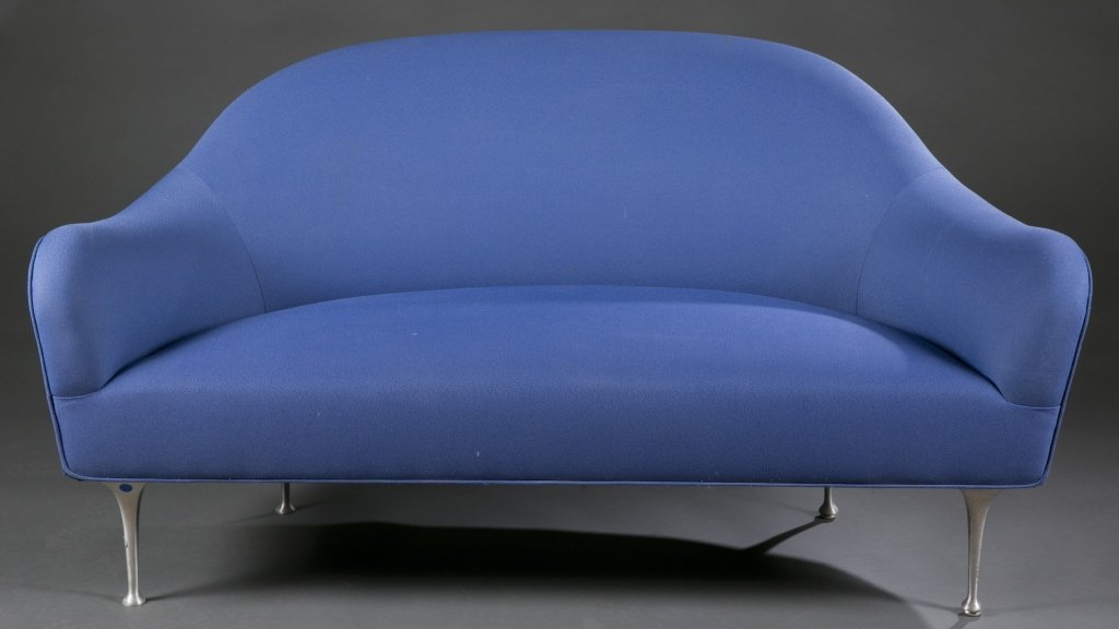 Modernica Impala loveseat.: A Modernica Impala loveseat. 2nd half 20th century. Blue upholstery and molded aluminum legs.