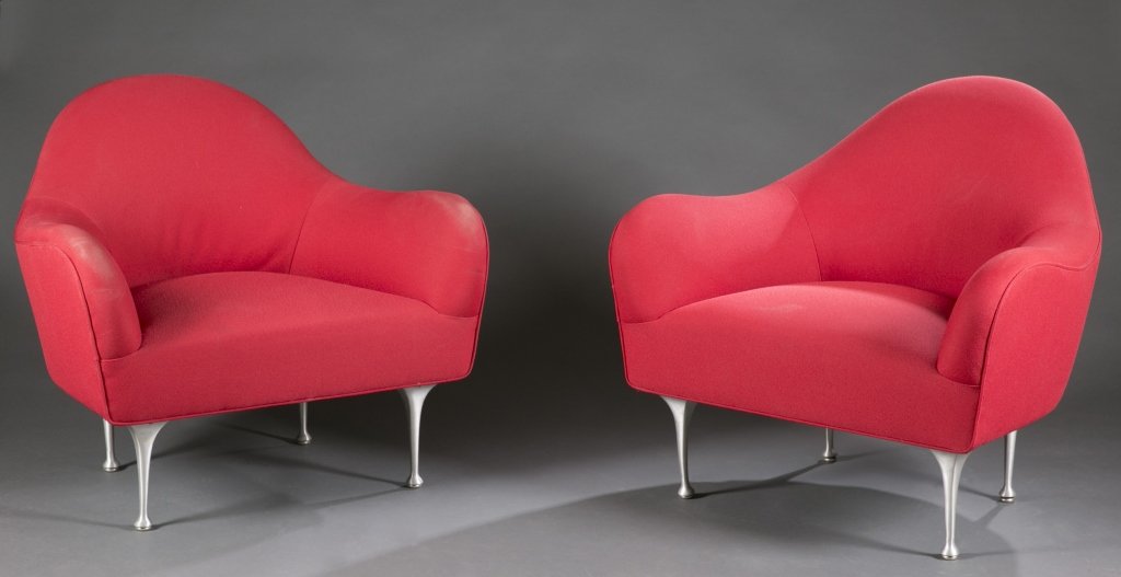 Pair of Modernica Impala armchairs.: A pair of Modernica Impala armchairs. 2nd half 20th century. Red upholstered armchair with molded aluminum legs.