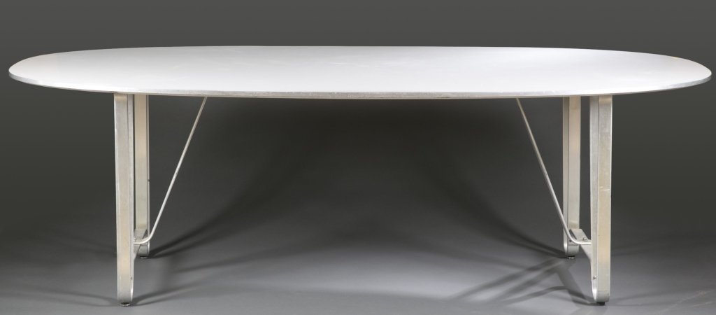 Danish Modern Fritz Hansen table: A Piet Hein and Bruno Mathsson table. 2nd half 20th century. White laminate table top with metal base (not original to top). On underside of table, stamped "DESIGN PIET HEIN, BRUNO MATHSSON FRITZHANSE