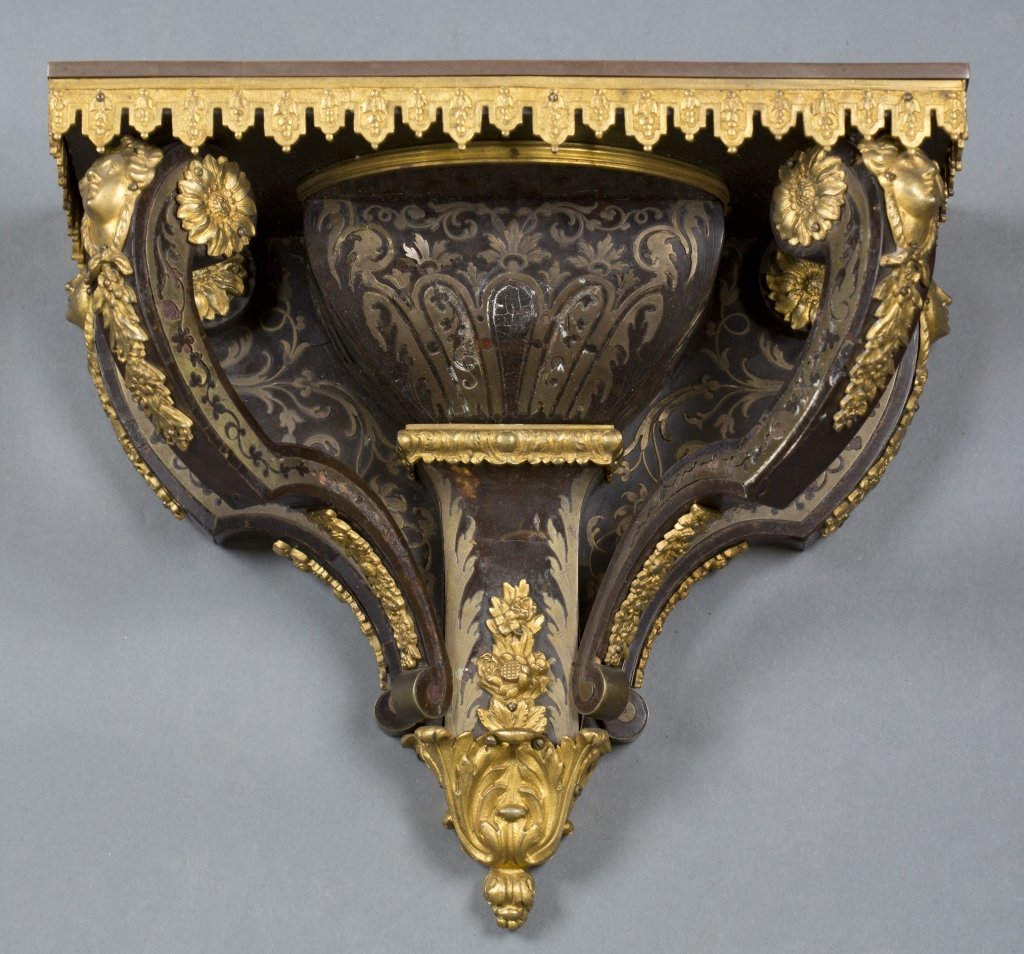 French 19th c. Boulle wall bracket/shelf.: A French Boulle wall bracket/shelf. 19th century. Tortoise shell and gilt inlay with gilt bronze ormolu details of bell flowers, sunflowers and caryatid decoration. 11"h x 12 3/4"w 6 3/8"d.