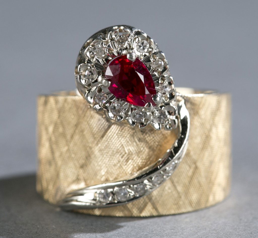 Ruby and diamond 14kt yellow gold ring.