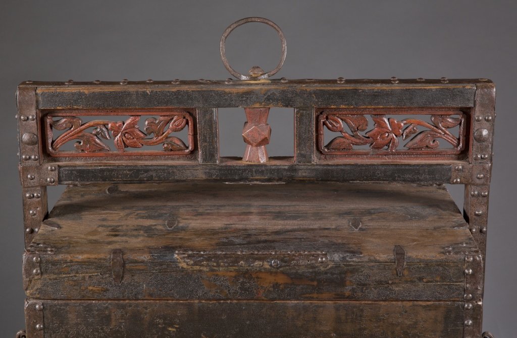 Chinese tiered wedding chest, 19th c.: A chinese tiered wedding / dowry chest. 19th century. Solid wood with iron frame and reinforcement. 4 tiers of interlocking boxes with a top wooden lid and decorative red painted floral and geometric 