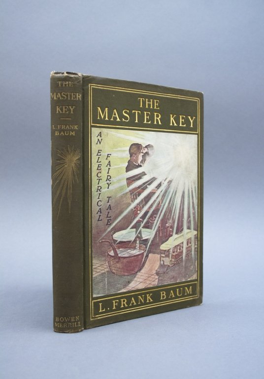 Signed & inscribed: L. Frank Baum. THE MASTER KEY.: [Children's] Baum, L. Frank. THE MASTER KEY. Bowen-Merrill Company, (1901). Ffep signed and inscribed to “Hary Neal Baum/ from his loving father/ L. Frank Baum./ the fall of 1901.” Faep has printe