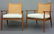 A pair of Danish Mid Century Modern lounge chairs.